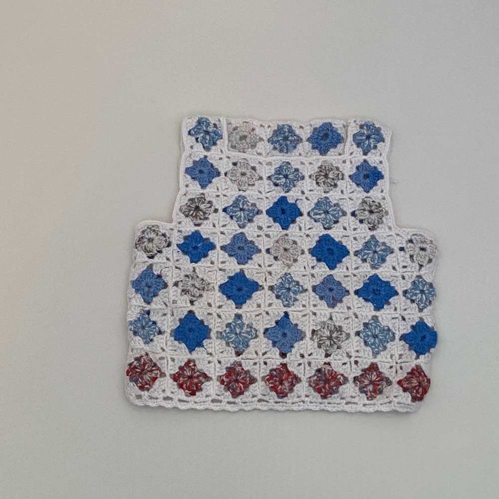 Handcrafted baby vest